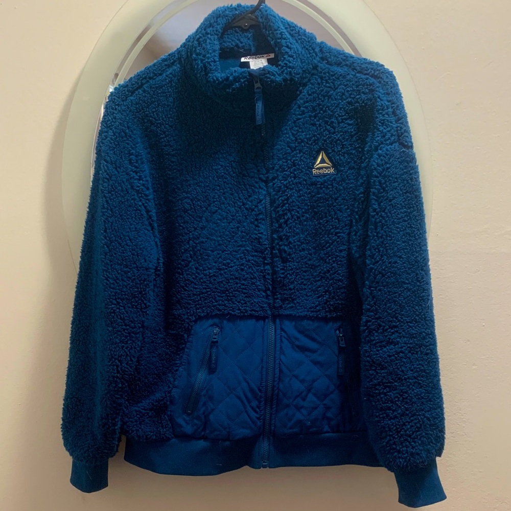 NWOT Reebok Men's zip-up logo Fleece jacket with zipper pockets with lining. Med